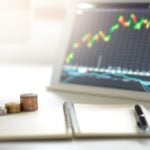 Apple, Airbnb, TSMC, AppLovin y DraftKings: 5 acciones que están en el radar de los inversores